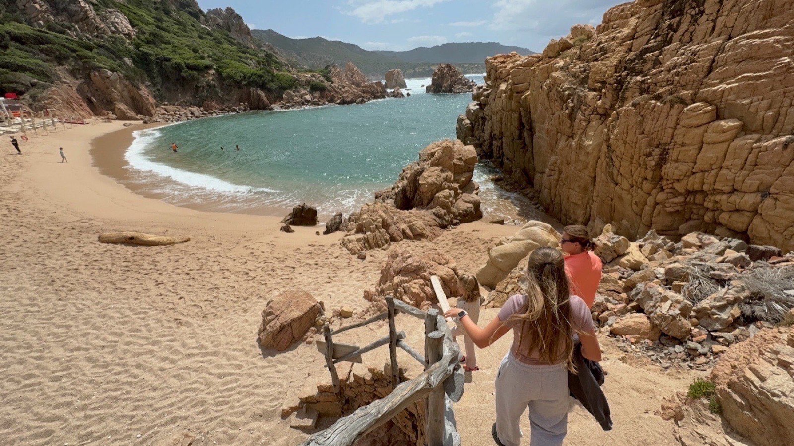 The hidden crescent of Spiaggia di Li Cossi at the end of the Costa Paradiso path